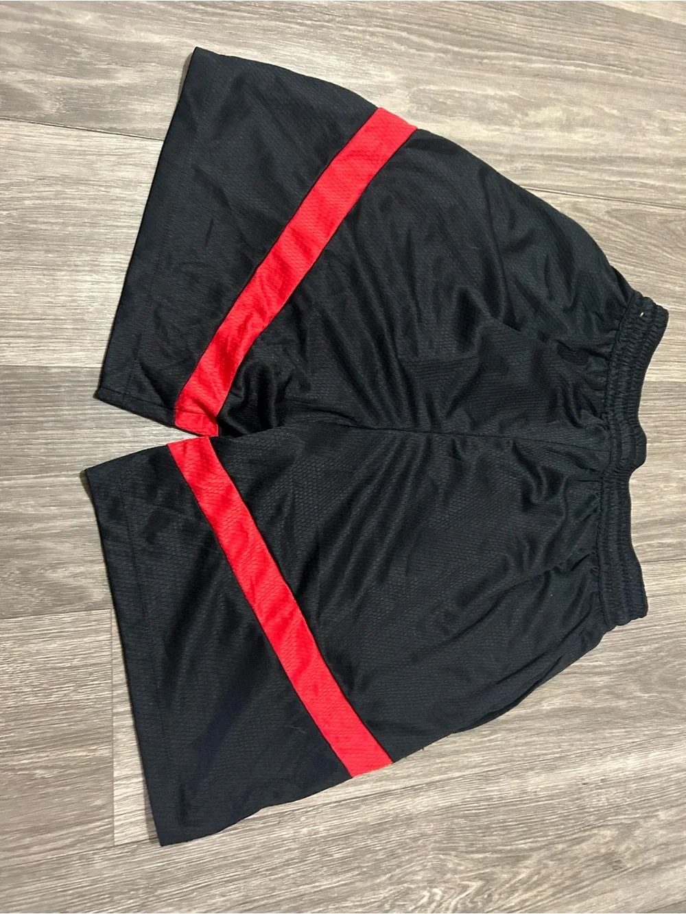 Nike Black Shorts with Red Accent Stripe